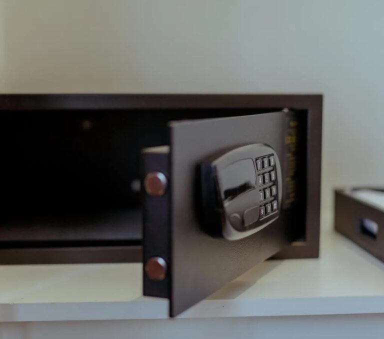 A tent's keypad safe, with its door open