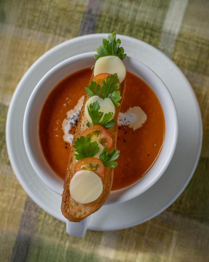 A cream soup served with croutons